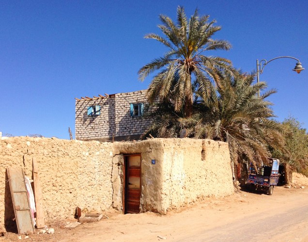Old kersheef house, newer limestone brick house behind.