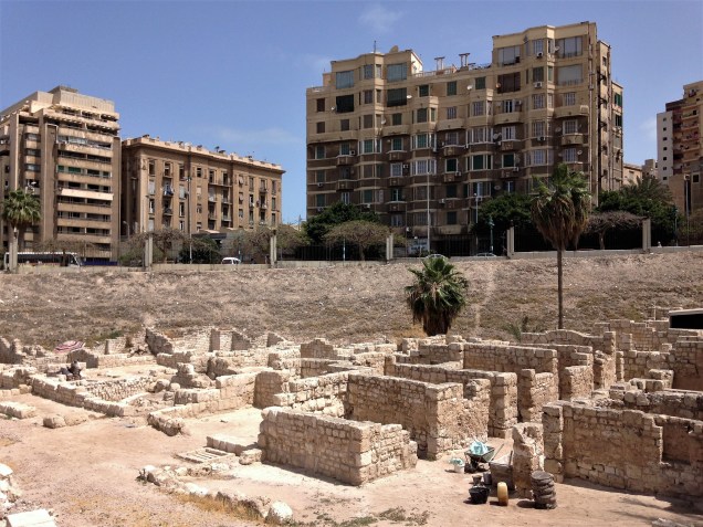Ancient Alexandria houses in Kom el Dekka and modern apartment buildings above the archaeological site.