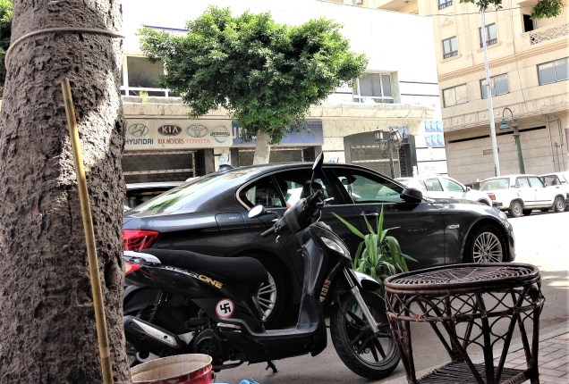 A motorcycle with a swastika sticker, Alexandria, Egypt