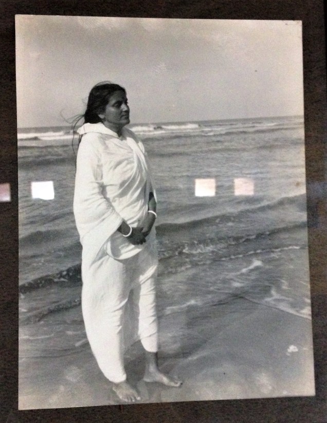 Ma Anandamayi by the sea. A photo in the meditation hall at the Ma Anandamayi Ashram, Patal Devi, Almora, Uttarakhand.
