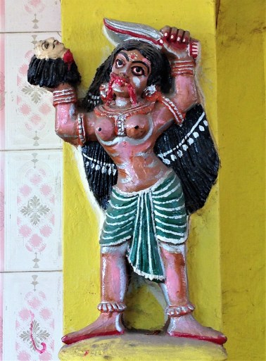 Sculpture of Kali at entrance to burning ground, Puri, Odisha