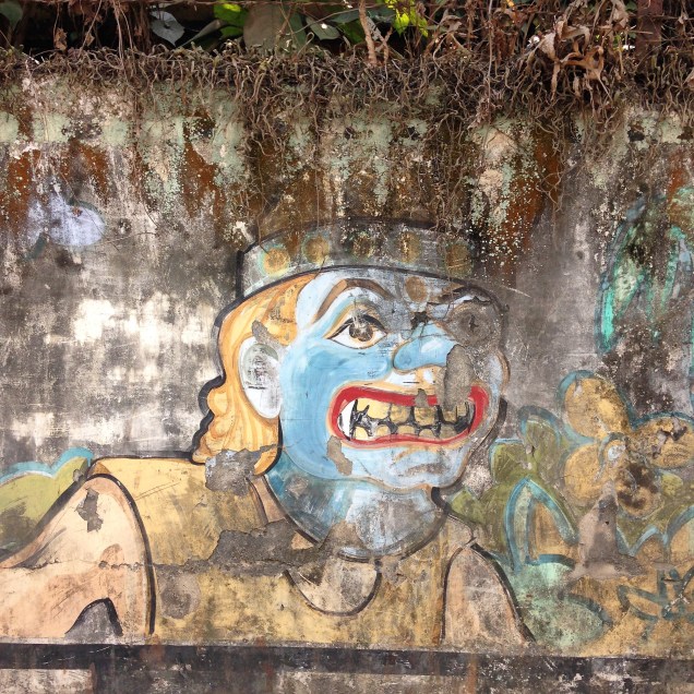 Theatrical mask on an actor, wall mural, Guwahati